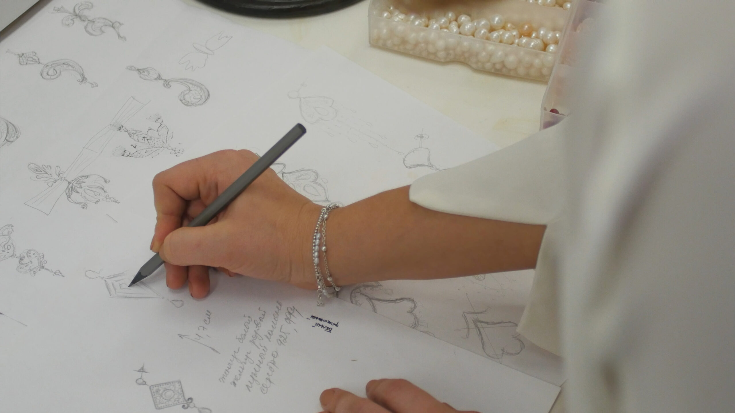 Drawing Jewellery in Silver Jewellery studio.